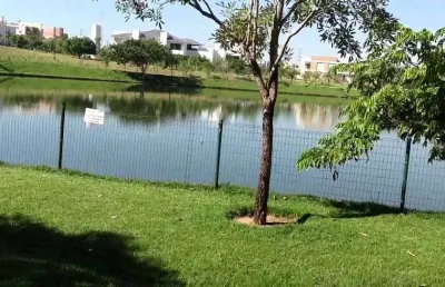 Lote no condomínio alphaville - jardim itália - próximo do parque tia nair e jardim das américas