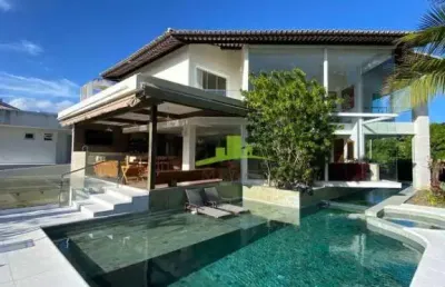 Casa à venda de alto luxo em busca vida - buscaville, 959m², 4/4 sendo 3 suítes, piscina, espaço gourmet, adega refrigerada, sistema de energia solar.