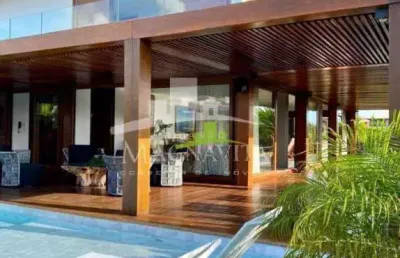 Praia do forte | casa com 380m² | 5 suítes sendo 4 com varanda  (1 suíte térrea) | piscina | 2 garagens | beira mar | porteira fechada | energia solar