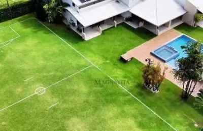 Casa de luxo à venda no encontro das águas1.370m² construídos, 5 suítes, pé direito duplo, piscina com raia de 25m. lauro de freitas. porteira fechada