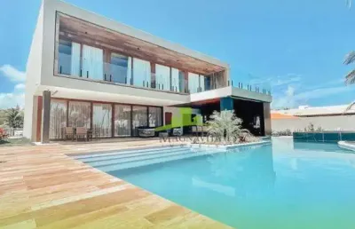 Casa frente mar em guarajuba, 6 suítes, piscina, área gourmet, alto luxo e porteira fechada. imóvel exclusivo em condomínio. agende sua visita!