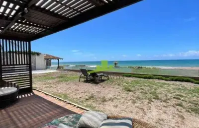 Casa a venda litoral norte | praia dos lagos | casa pé na areia e fundo lago | frente mar | reformada | porteira fechada | 4 suítes | energia solar