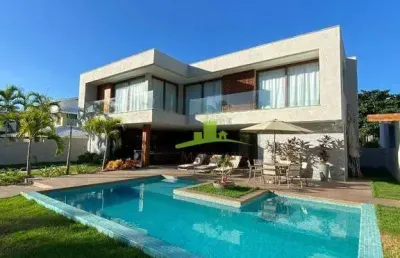Casa à venda no condomínio paraíso, guarajuba, 303m², 7 suítes, piscina, área gourmet, a 20m da praia, porteira fechada. agende sua visita!