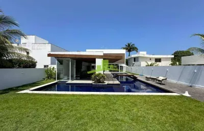 Casa de luxo à venda em interlagos, litoral norte: 5 suítes, 750m², piscina, área gourmet, arquitetura moderna de david bastos, segurança 24h