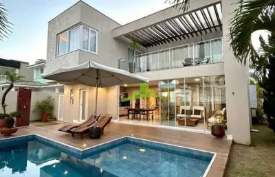 Casa de luxo em alphaville litoral norte 1 | 4 suítes | 306m² | piscina privativa | energia solar | r$ 2.540.000
