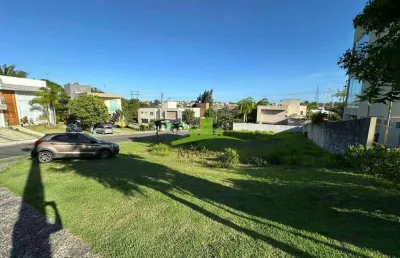 Terreno à venda alphaville salvador 2, 490m², lote de esquina com leve declive. excelente localização. oportunidade em condomínio de alto padrão