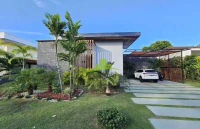 Casa moderna térrea à venda no condomínio vida marina, busca vida, camaçari | 3 suítes no térreo | piscina com cascata e área gourmet