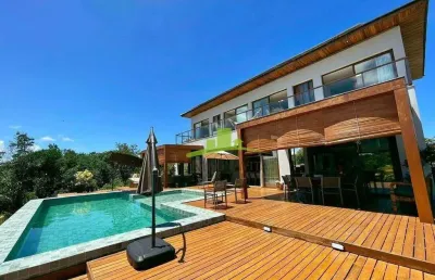 Casa de alto padrão à venda no condomínio praia bella, praia do forte, 5 suítes, espaço gourmet, piscina e área verde. litoral norte. r$ 4.190.000,00