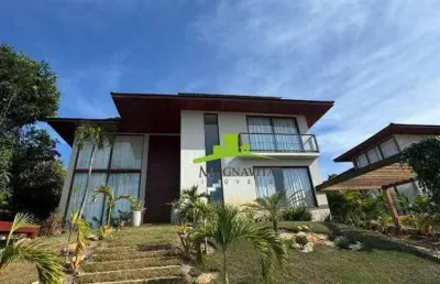 Praia do forte, mansão à venda. condomínio ilha dos pássaros, 5 suítes, 400m², piscina com cascata, sustentável, porteira fechada. oportunidade!
