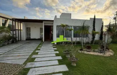 Alphaville litoral norte 3. casa térrea à venda 220m², 4 quartos, 3 suítes, pé direito duplo, energia solar. 507m² de terreno. alto padrão. conforto
