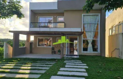 Alphaville litoral norte 2. casa alto padrão à venda com 330m², 4 suítes, piscina, espaço gourmet, vista área verde. lazer completo. pronta para morar