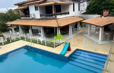 Vilas do atlântico. casa à venda alameda fechada, 373m², 6/4 (3 suítes internas + 3 suítes externas), piscina, espaço gourmet. excelente oportunidade!
