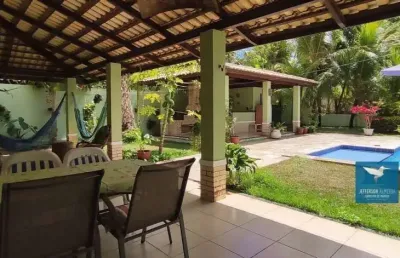 Casa em condomínio no eusébio, móveis projetados, deck e piscina, 216m2, 03 suítes, 02 gabinetes, 04 vagas, lote 776m2