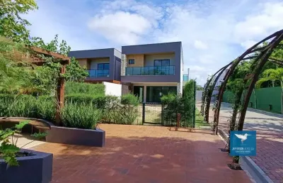 Repasse exclusivo! casa de esquina no giverny condomínio jardim em eusébio. sucesso de vendas! pronto para morar. são 04 suítes, 151m2 de construção, lote 201m2, 03 vagas