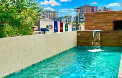 Apartamento novo com 2 quartos a poucos passos da praia 