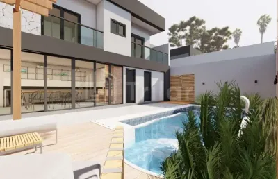 Maravilhosa casa térrea em condomínio com 3 suítes, 4 vagas de garagem e piscina e área gourmet