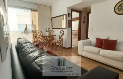 Apartamento padrão com 2 dormitórios sendo um suíte com sacada lado praia na praia da enseada - guarujá/sp