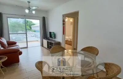 Apartamento padrão com acesso a sacada, 2 dormitórios, lado praia - enseada-guarujá/sp.