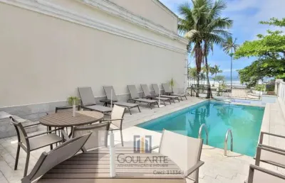 Casa duplex em condomínio frente mar com área de lazer, 4 suítes, na praia da enseada - guarujá/sp.