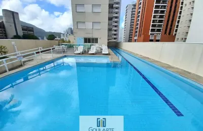 Apartamento com 2 dormitórios sendo 1 suíte climatizada, lazer no condomínio na praia das pitangueiras-guarujá/sp