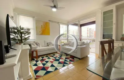 Apartamento em ótima localização na praia da enseada com 3 quartos sendo 1 suíte com ampla sacada