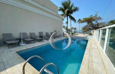 Casa com 4 suítes em comdominio fechado na praia da enseada,á poucos metros da praia