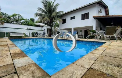 Casa com 6 suítes à venda no condomínio acapulco - guarujá / sp