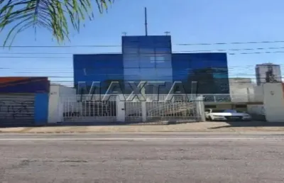 Prérdio com 520m² construído com 8 vagas fixas e 16 com manobrista na av. general ataliba leonel.