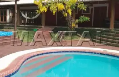 Casa à venda em ilhabella, de 500m², com 5 dormitórios, 7 vagas e piscina natural.