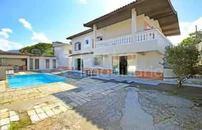 Casa à venda com piscina e 4 quartos em peruíbe, no bairro centro