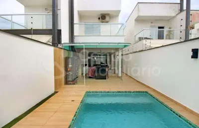 Casa à venda com piscina e 3 quartos em peruíbe, no bairro centro