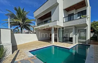 Casa à venda com piscina e 4 quartos em peruíbe, no bairro balneario sao joao batista