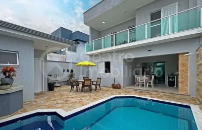 Casa à venda com piscina e 4 quartos em peruíbe, no bairro estancia sao jose