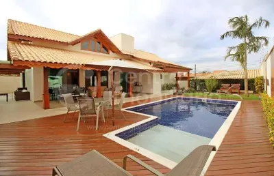 Casa à venda com piscina e 4 quartos em peruíbe, no bairro stella maris