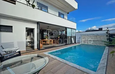 Casa à venda com piscina e 4 quartos em peruíbe, no bairro residencial flora rica