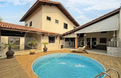 Casa à venda com piscina e 4 quartos em peruíbe, no bairro stella maris