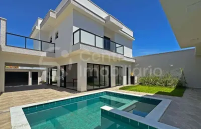 Casa à venda com piscina e 4 quartos em peruíbe, no bairro jardim imperador