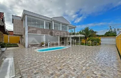 Casa à venda com piscina e 4 quartos em peruíbe, no bairro jardim sao luiz