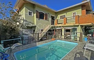 Casa à venda com piscina e 5 quartos em peruíbe, no bairro estancia sao jose