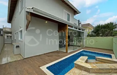 Casa à venda com piscina e 4 quartos em peruíbe, no bairro jd tres marias