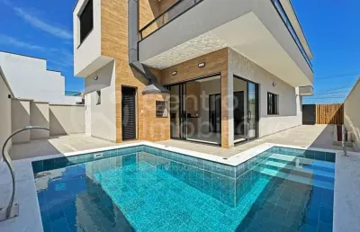Casa à venda com piscina e 4 quartos em peruíbe, no bairro bougainvillee iv