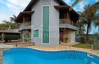 Casa à venda com piscina e 4 quartos em peruíbe, no bairro bougainvillee i