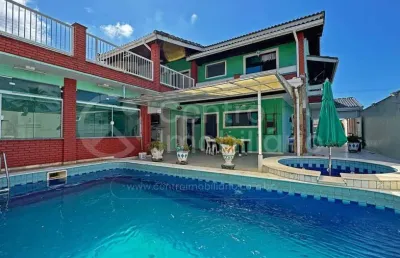Casa à venda com piscina e 4 quartos em peruíbe, no bairro stella maris