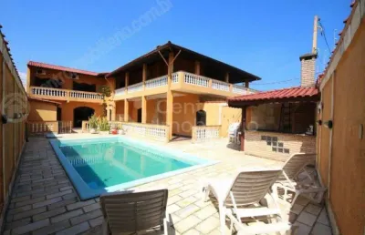 Casa à venda com piscina e 6 quartos em peruíbe, no bairro belmira novaes