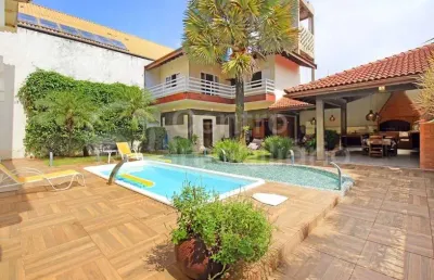 Casa à venda com piscina e 4 quartos em peruíbe, no bairro balneario florida