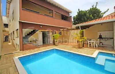Casa à venda com piscina e 4 quartos em peruíbe, no bairro maria h novaes