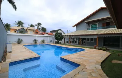 Casa à venda com piscina e 4 quartos em peruíbe, no bairro parque turistico