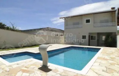 Casa à venda com piscina e 4 quartos em peruíbe, no bairro centro