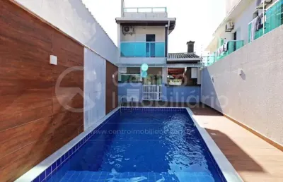 Casa à venda com piscina e 4 quartos em peruíbe, no bairro centro