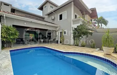 Casa à venda com piscina e 4 quartos em peruíbe, no bairro jardim imperador